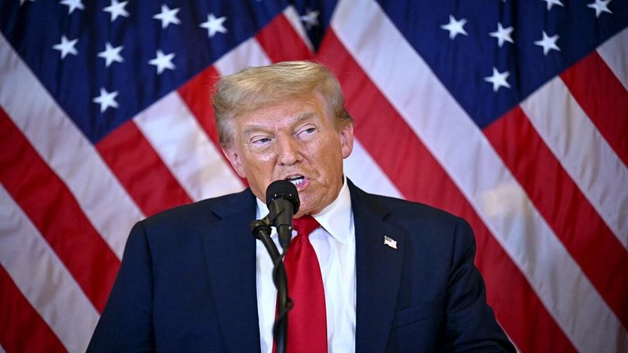 Donald Trump speech US flags.jpg