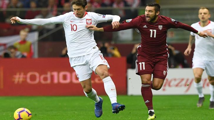 Lett vinst för tabelltoppande Polen