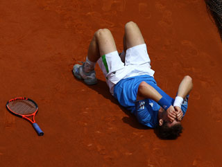 Andy Murray lies on the floor after spraining his ankle - will the injury stop him today?