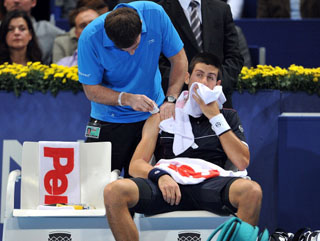 Playing through the pain barrier. But Djokovic may have one eye on the London end of year showdown.