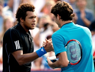 Jo Wilfried Tsonga and Roger Federer after their last meeting, which the Frenchman won, last year