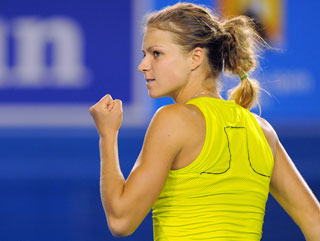 Maria Kirilenko can get past the tenacious Vinci 