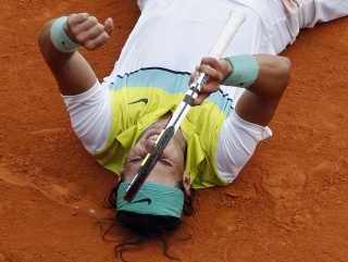 Rafael Nadal falls to the ground in jubilation at winng the Monte Carlo Masters. Will he triumph this year?