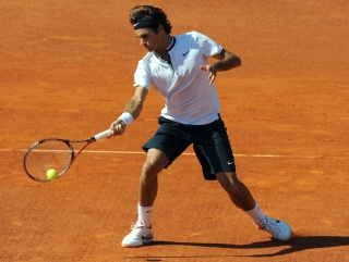 Roger Federer faces a tough test from his compatriot