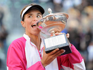 Maria Jose Martinez-Sanchez gets her teeth into the Rome Open trophy but will you be having a nibble on her price of [42.0]? 