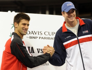 Novak Djokovic of Serbai and John Isner of USA